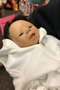 Doll collecting photo of Irene Storey OOAK baby reborn as "Noah."