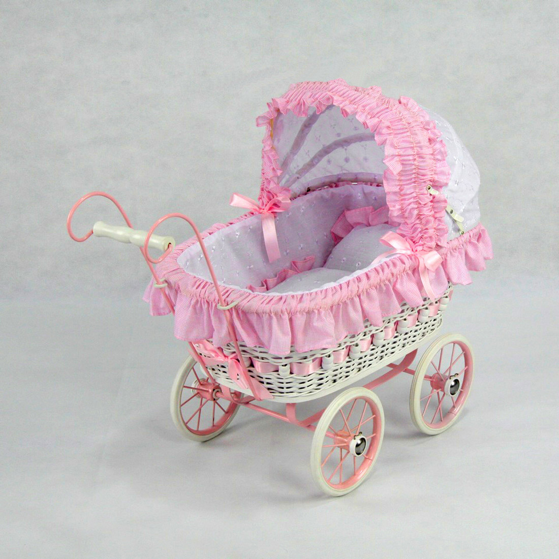 white wicker doll carriage