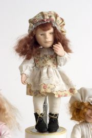 Button Box Kid Louise - limited edition porcelain collectible doll  by doll artist Hal Payne.