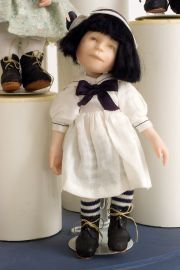 Button Box Kid Sissy - limited edition porcelain collectible doll  by doll artist Hal Payne.