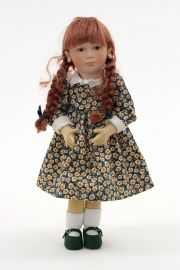 Rebecca - collectible limited edition felt molded art doll by doll artist Maggie Iacono.