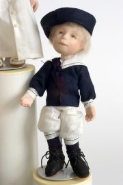 Button Box Kid Joey - limited edition porcelain collectible doll  by doll artist Hal Payne.