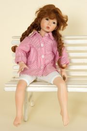 Claudine - collectible limited edition porcelain soft body art doll by doll artist Gaby Rademann.