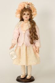 Julieanna - collectible limited edition porcelain wax over art doll by doll artist Janet Ness.