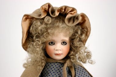 Lucy Gray - limited edition porcelain and wood collectible doll  by doll artist Wendy Lawton.