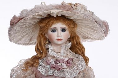 Simmone - collectible one of a kind porcelain soft body art doll by doll artist Vicki Gunnell.