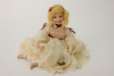 Becky with Bird - collectible limited edition porcelain soft body art doll by doll artist Yolanda Bello.