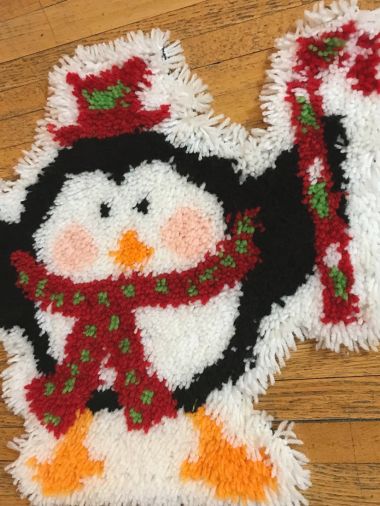 Phot of Peppey Penguin hand-latched rug.