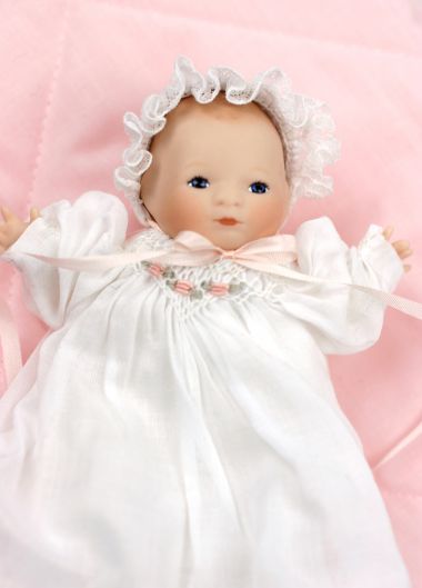 Tiny Bye Lo Baby - limited edition porcelain collectible doll  by doll artist Wendy Lawton.