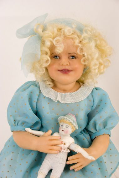 Molly - collectible one of a kind polymer clay art doll by doll artist Rotraut Schrott.