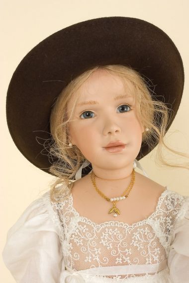 Minoush - collectible limited edition porcelain soft body art doll by doll artist Sonja Hartmann.