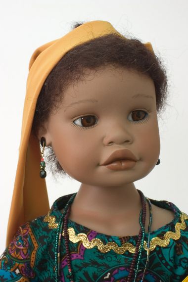 Muluken - collectible limited edition porcelain soft body art doll by doll artist Yolanda Bello.