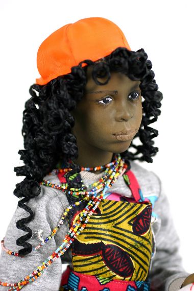 Black Child no.22 - collectible one of a kind finished porcelain art doll by doll artist Uta Brauser.