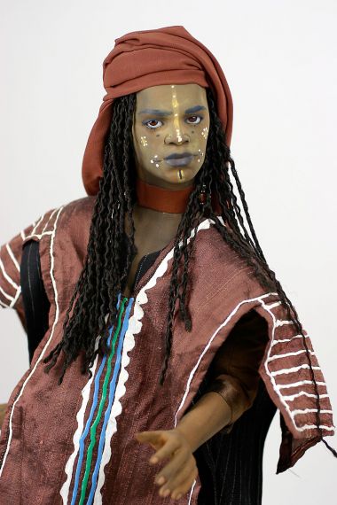 Wodaabe Man no.1 - collectible one of a kind finished porcelain art doll by doll artist Uta Brauser.