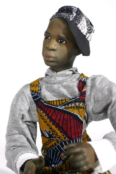 Black Boy no.3 - collectible one of a kind finished porcelain art doll by doll artist Uta Brauser.