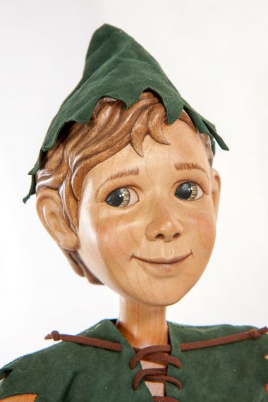 Detail view of Peter Pan wood art doll by Marlene Xenis