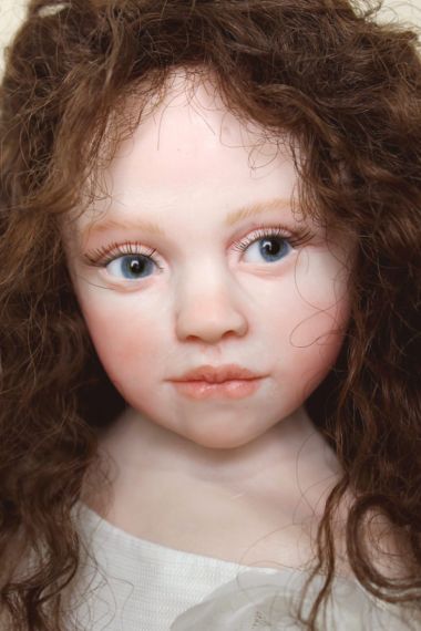 Close up photo of Rose doll by Italian doll artist Elisa Gallea