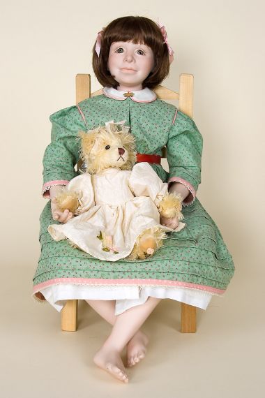 Rackel with Chair - collectible limited edition porcelain art doll by doll artist Beth Cameron.