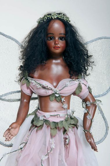 Nina - collectible one of a kind porcelain art doll by doll artist Sylvia Weser.