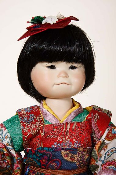 Mayumi - collectible limited edition porcelain soft body art doll by doll artist Yolanda Bello.