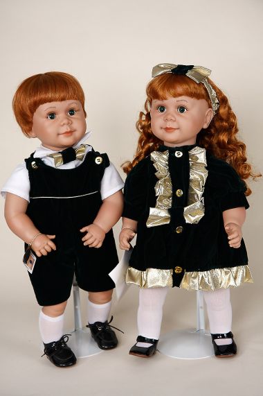 Christmas Boy and Girl - collectible limited edition vinyl play doll by doll artist Johanna Zook.